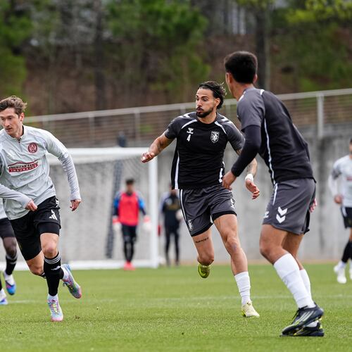 Atlanta United midfielder Alexey Miranchuk (left) runs with the ball against Lexington Sporting Club during their preseason match at the Children’s Healthcare of Atlanta Training Ground on Friday, Jan. 30, 2026, in Marietta. (Matthew Dingle/Atlanta United)