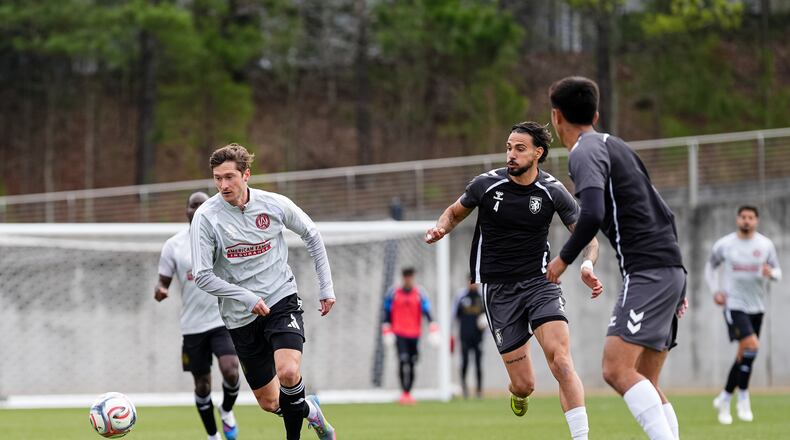 Atlanta United midfielder Alexey Miranchuk (left) runs with the ball against Lexington Sporting Club during their preseason match at the Children’s Healthcare of Atlanta Training Ground on Friday, Jan. 30, 2026, in Marietta. (Matthew Dingle/Atlanta United)