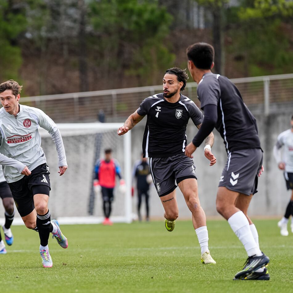 Atlanta United midfielder Alexey Miranchuk (left) runs with the ball against Lexington Sporting Club during their preseason match at the Children’s Healthcare of Atlanta Training Ground on Friday, Jan. 30, 2026, in Marietta. (Matthew Dingle/Atlanta United)