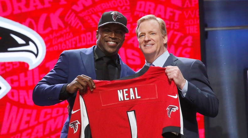 Floridas Keanu Neal poses for photos with NFL commissioner Roger Goodell after being selected by Atlanta Falcons as the 17th pick in the first round of the 2016 NFL football draft, Thursday, April 28, 2016, in Chicago. (AP Photo/Charles Rex Arbogast)