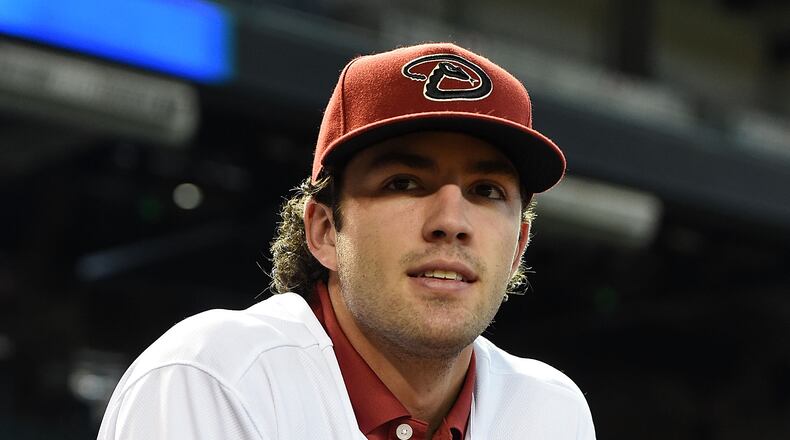 Dansby Swanson of the Arizona Diamondbacks, the first overall pick in the 2015 Major League Baseball draft, watches batting practice prior to a game against the Miami Marlins at Chase Field on July 20, 2015 in Phoenix, Arizona. (Photo by Norm Hall/Getty Images)