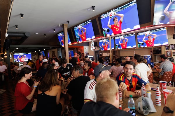 Brewhouse Cafe in South downtown is nearly full with customers in Atlanta while the Belgium-Egypt World Cup match plays on TV on Monday, June 15, 2026. (Estela Muñoz/AJC)