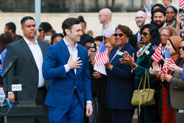 Democratic U.S. Sen. Jon Ossoff greets supporters before speaking at a rally last month in Atlanta. (Jason Getz/AJC)