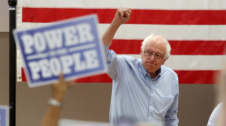 Sen. Bernie Sanders, I-Vt., walks onto the stage during a Get Out the Vote campaign event supporting Massachusetts Sen. Ed Markey in Boston, Saturday, Aug. 29, 2026. (AP Photo/Mark Stockwell)