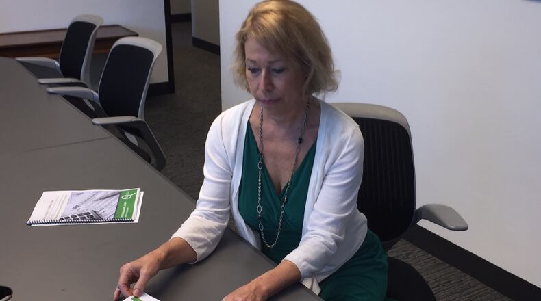 Liz Coyle, executive director of Georgia Watch, says "it's absolutely crazy" that the tax preparer industry is unregulated.