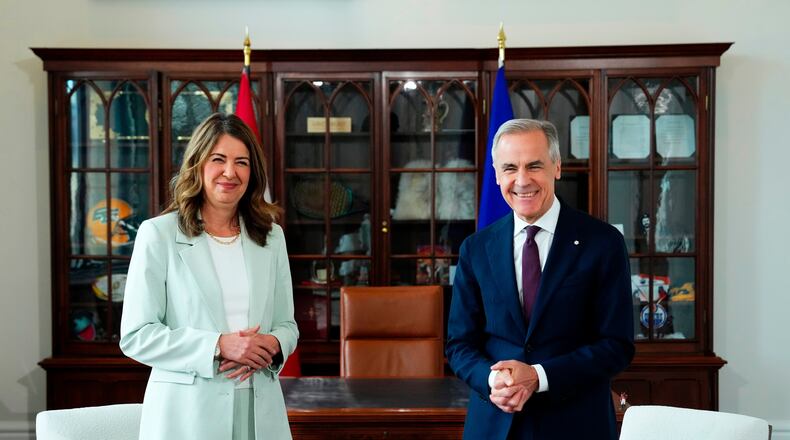 FILE - Prime Minister Mark Carney, right, meets with Premier of Alberta Danielle Smith at his office in Ottawa on Friday, May 8, 2026. (Sean Kilpatrick/The Canadian Press via AP, File)