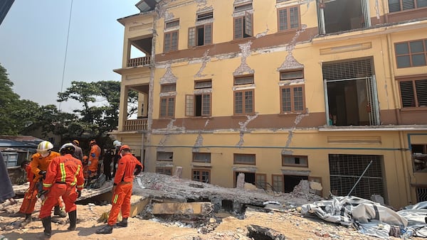 Rescuers work at U Hla Thein Buddhist monastery that collapsed in Friday's earthquake in Mandalay, Myanmar, Monday, March 31, 2025. (AP Photo/Thein Zaw)