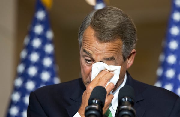 House Speaker John Boehner of Ohio, wipes away his tears, as he delivers his remarks during a ceremony honoring the members of the First Special Service Force whose fearlessness and bravery contributed to the liberation of Europe and end to World War II, with a Congressional Gold Medal on Capitol in Washington Tuesday, Feb. 3, 2015. (AP Photo/Manuel Balce Ceneta)