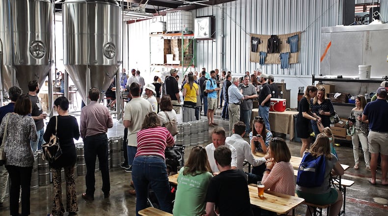 Good times in the tasting room at Gate City Brewing in Roswell. Photo Credit - Full Measure Photography - Caroline Carr.