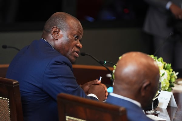 Gabonese President Brice Oligui Nguema speaks to President Donald Trump during a lunch with African leaders in the State Dining Room of the White House, Wednesday, July 9, 2025, in Washington. (AP Photo/Evan Vucci)