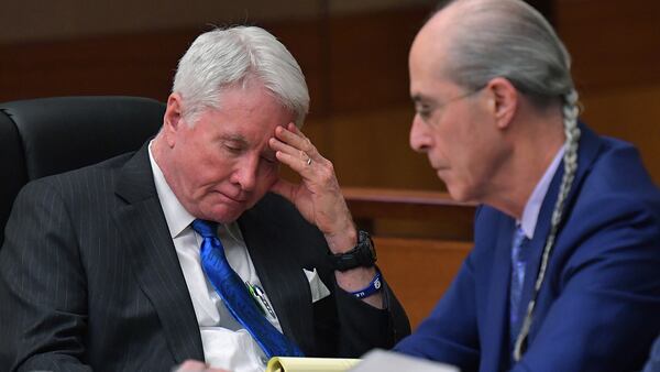 March 13, 2018 Atlanta - Tex McIver (left) reacts as he sits with his defense attorney Bruce Harvey during the first day of trial of Tex McIver before Fulton County Chief Judge Robert McBurney. HYOSUB SHIN / HSHIN@AJC.COM