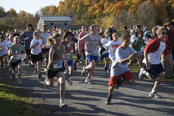 Participants race in the Sugarloaf Turkey Trot in Duluth to help raise money for Gwinnett County charities.