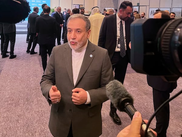 Iranian Foreign Minister Abbas Araghchi speaks to the media as he arrives to the Council of Foreign Ministers of the Organisation of Islamic Cooperation meeting, in Istanbul, Turkey, Saturday, June 21, 2025. (AP Photo/Mehmet Guzel)
