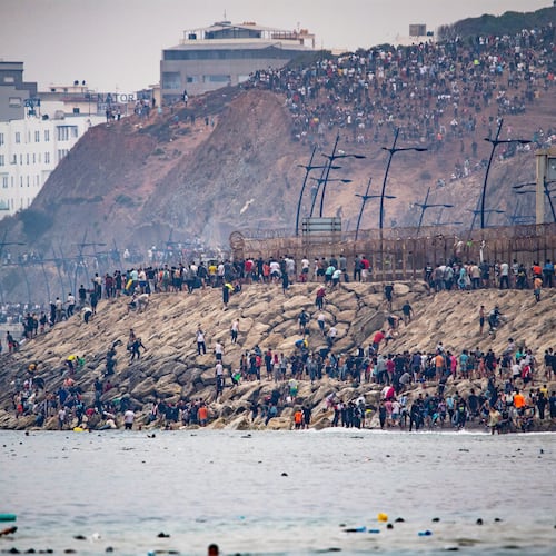 Migrants return to Morocco from the Spanish enclave of Ceuta, Friday, July 31, 2026. (AP Photo/Antonio Sempere)