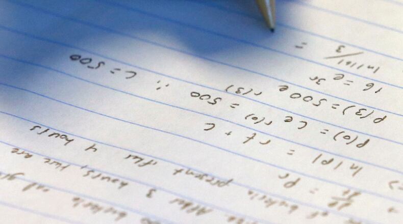 Sep. 1, 2015 - Lawrenceville - A student takes nots in a Differential Equations class at the Gwinnett School of Mathematics, Science, and Technology in Lawrenceville, which had the highest combined SAT score among all high schools in Georgia for 2015. BOB ANDRES / BANDRES@AJC.COM
