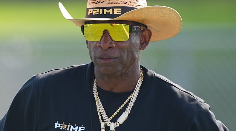 Deion Sanders, now the head coach for Colorado, was selected by the Atlanta Falcons with the fifth overall pick in the first round of the 1989 NFL draft. There was always substance with the style for “Prime Time” the player, AJC columnist Michael Cunningham writes. (David Zalubowski/AP)