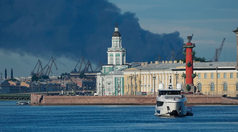 FILE - A plume of black smoke rises over the port of St. Petersburg, Russia, on June 3, 2026, after a Ukrainian drone attack. (AP Photo, File)