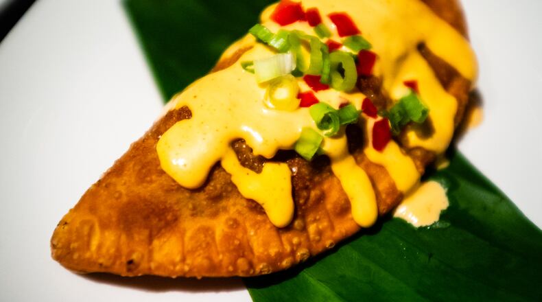 The simply named empanada de pollo at Loca Luna belies the complexity of the flavors found inside.