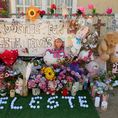 FILE - A makeshift Memorial for Celeste Rivas Hernandez, who was killed and found inside a vehicle owned by singer D4vd, is placed outside her home in Lake Elsinore, Calif., on April 21, 2026. (AP Photo/Damian Dovarganes, file)