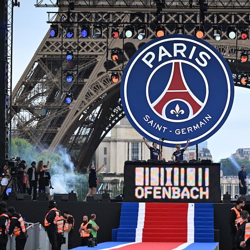 Artists perform ahead of PSG's celebrations the day after winning the Champions League title, at the Eiffel Tower, in Paris, Sunday, May 31, 2026. (AP Photo/Emma Da Silva)