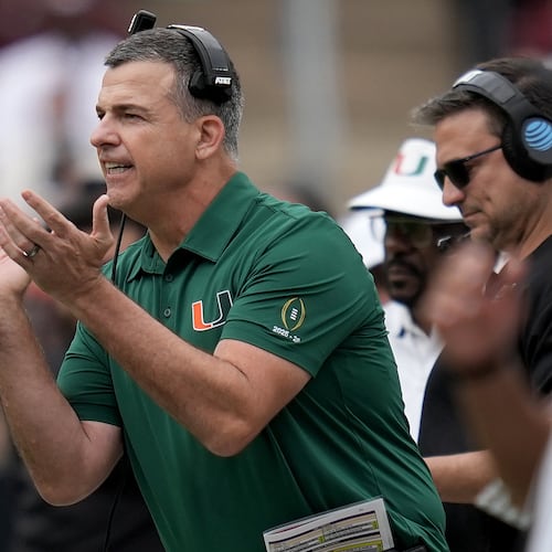 Miami head coach Mario Cristobal reacts to a play against Texas A&M during the first quarter in the first round of the NCAA College Football Playoff, Saturday, Dec. 20, 2025, in College Station, Texas. (AP Photo/Sam Craft)