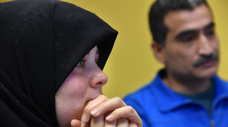 January 26, 2017 Atlanta - Syrian refugees Rouda and Mustafa Hammami spoke Thursday about how grateful they were that the International Rescue Committee helped them and their three children resettle in Atlanta. HYOSUB SHIN / HSHIN@AJC.COM