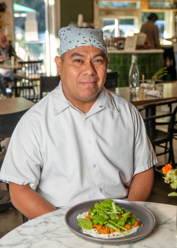 Daily Chew’s executive head chef Galdino Pelaez developed this caramelized butternut squash salad with cafe owner Julia Kesler Imerman. Imerman said she was inspired by the butternut salads she enjoyed as a child. (Aaliyah Man for the AJC)