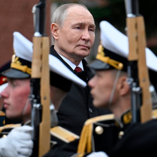 Russian President Vladimir Putin, centre foreground, attends a ceremony to lay flowers at the Tomb of the Unknown Soldier by the Kremlin wall inMoscow, Saturday, May 9, 2026, during celebrations of the 81st anniversary of the Soviet Union's victory over Nazi Germany during the World War II. (Alexander Nemenov/Pool Photo via AP)