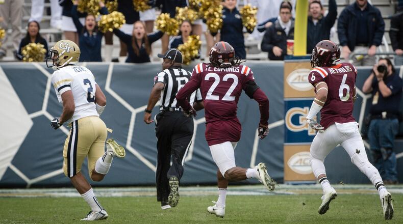 Georgia Tech wide receiver Ricky Jeune (2) runs for a touchdown as Virginia Tech safety Terrell Edmunds (22) and defensive back Mook Reynolds (6) give chase during the fourth quarter of a football game on Saturday, Nov.11, 2017, in Atlanta. (Photo/John Amis)
