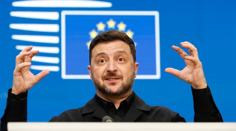 Ukraine's President Volodymyr Zelenskyy speaks during a media conference at the EU Summit in Brussels, Thursday, Dec. 18, 2025. (AP Photo/Geert Vanden Wijngaert)