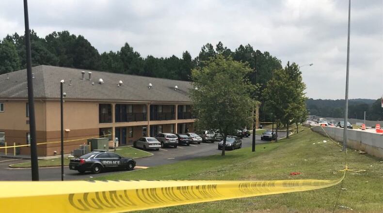 DeKalb County police are investigating a triple shooting at a motel off Flat Shoals Road near I-285 Monday afternoon.