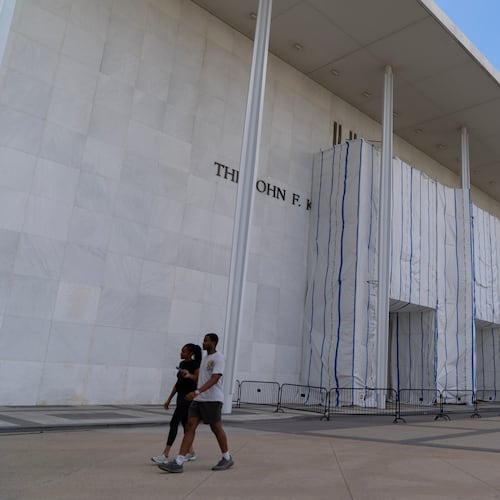 Visitors walk at The John F. Kennedy Center for the Performing Arts, Sunday, Sept. 6, 2026, in Washington. (AP Photo/Jose Luis Magana)