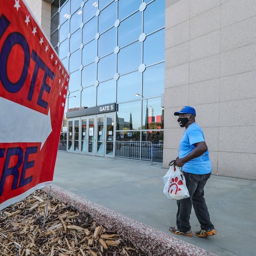 July 20, 2020 Atlanta: Larry Platt heads for the door of State Farm Arena to vote. Early voting for GeorgiaÕs runoff elections began Monday, including at a giant polling place on the Atlanta HawksÕ home court, State Farm Arena (shown here). The runoffs will decide races left unsettled after last monthÕs primaries, including for the U.S. House of Representatives, Fulton County district attorney, the Georgia General Assembly and superior courts. Three weeks of in-person early voting is available across Georgia, but the biggest voting site in state history is inside State Farm Arena in downtown Atlanta. The arena, equipped with 100 voting stations, is designed to ease long lines and provide a central location available to any of FultonÕs 814,000 registered voters. Eighteen other early voting sites are also available in Fulton. The arena transformed into a voting site after some voters waited for hours to cast their ballots in June because of social distancing requirements, precinct closures, poll worker shortages and difficulties operating GeorgiaÕs new voting equipment. Election officials say theyÕre making changes to avoid similar problems again. TheyÕre improving poll worker training, identifying overcrowded precincts and adding tech support staff at voting locations. After record turnout in the June 9 primary, with nearly 2.4 million voters, fewer people are expected to participate in the runoff. JOHN SPINK/JSPINK@AJC.COM