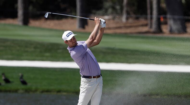 In this March 12, 2020, file photo, Harris English hits from a bunker on the seventh fairway during the first round of The Players Championship golf tournament in Ponte Vedra Beach, Fla. (AP Photo/Chris O'Meara, File)