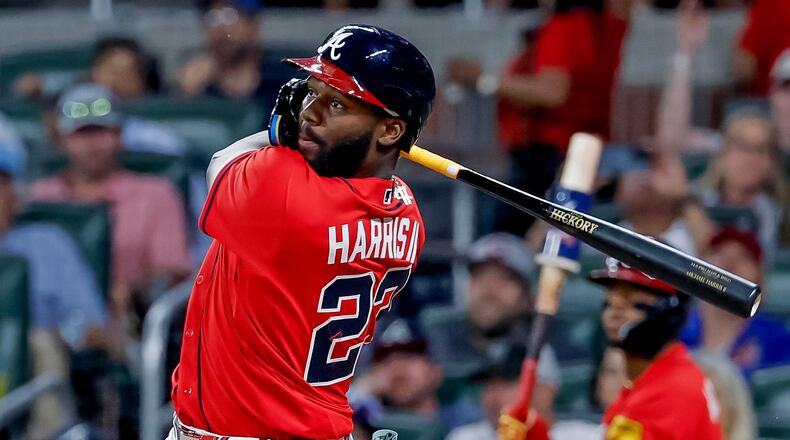 Atlanta Braves pinch hitter Michael Harris II follows through on a two-RBI double against the Philadelphia Phillies during the sixth inning of a baseball game, Friday, April 24, 2026, in Atlanta. (Erik S. Lesser/AP)