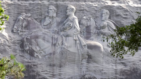 This June 23, 2015, file photo shows a carving depicting confederates Stonewall Jackson, Robert E. Lee and Jefferson Davis, in Stone Mountain, Georgia. (John Bazemore/AP)