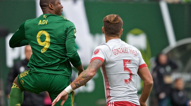 Portland Timbers forward Fanendo Adi (9) heads the ball during the first half at Providence Park. (Craig Mitchelldyer-Portland Timbers)