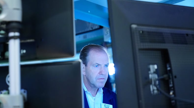 Michael Smyth works on the floor at the New York Stock Exchange in New York, Monday, Sept. 14, 2026. (AP Photo/Seth Wenig)