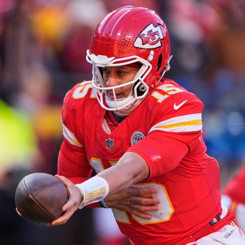FILE - Kansas City Chiefs quarterback Patrick Mahomes hands off the ball during the second half of an NFL football game against the Los Angeles Chargers, Dec. 14, 2025, in Kansas City, Mo. (AP Photo/Charlie Riedel, File)