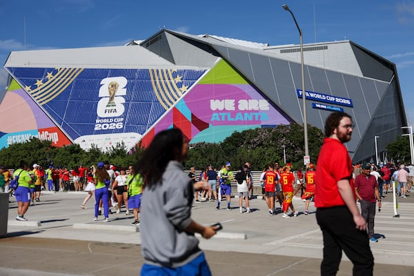 Fans head to Atlanta Stadium (Mercedes-Benz Stadium) for Monday's Spain-Cape Verde match, the first of 8 World Cup games in Atlanta. (Arvin Temkar/AJC)