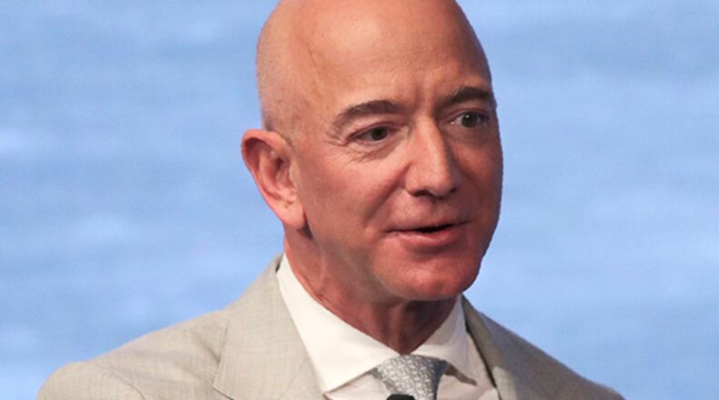 FILE - In this June 19, 2019, file photo, Amazon founder Jeff Bezos speaks during the JFK Space Summit at the John F. Kennedy Presidential Library in Boston. Bezos is one of the 50 Americans who gave the most to charity in 2020, according to the Chronicle of Philanthropy’s annual rankings. (AP Photo/Charles Krupa, File)