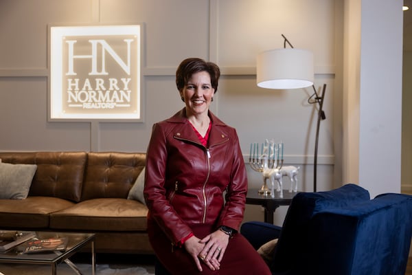  “I’d like to think there’s also an entrepreneurial stretch in all of us," says Harry Norman, Realtors CEO Jenni Bonura. (Jason Getz/AJC)