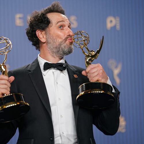 Matthew Rhys poses in the press room with the awards for outstanding lead actor in a limited or anthology series or movie for "The Beast In Me," and outstanding lead actor in a comedy series for "Widow's Bay" during the 78th Emmy Awards on Monday, Sept. 14, 2026, at the JW Marriott in Los Angeles. (Photo by Richard Shotwell/Invision/AP)