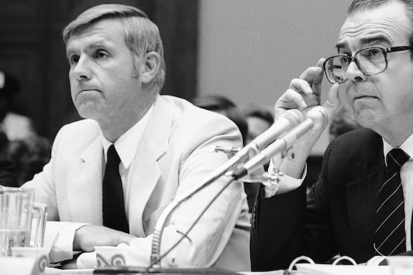 Dr. William Foege (left) director of the Centers for Disease Control and Prevention, and Dr. Edward Brandt, assistant secretary of health, face a House Governmental Operations subcommittee on Capitol Hill in Washington on Tuesday, Aug. 3, 1983. (John Duricka/AP 1983)
