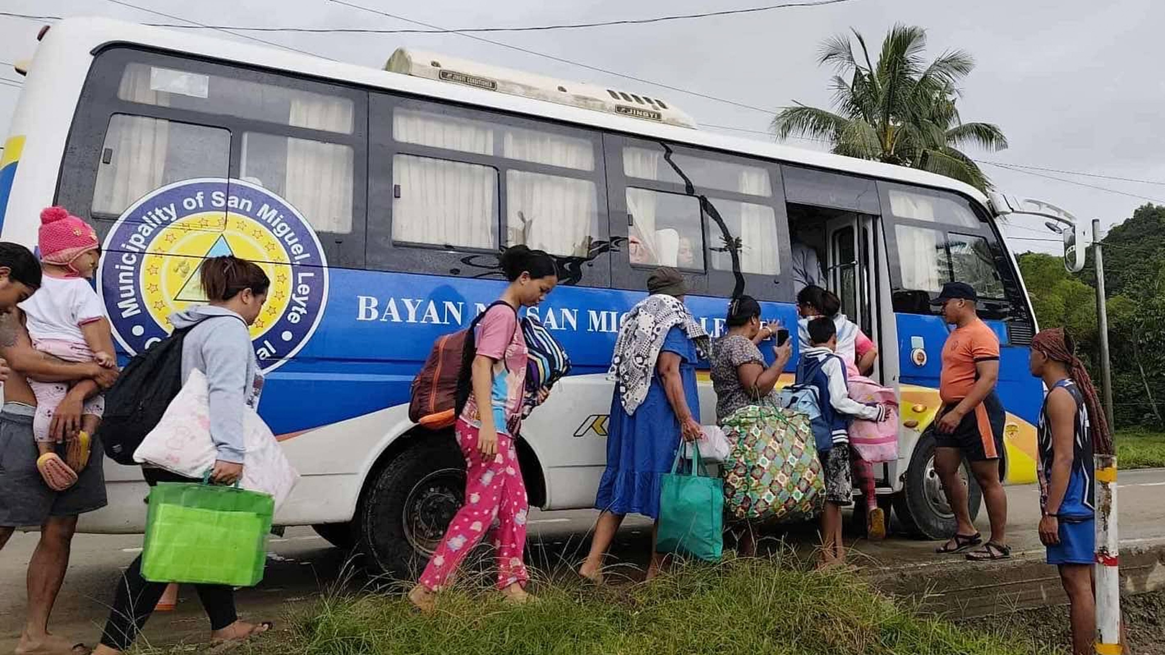 In this photo provided by the Philippine Coast Guard, residents are evacuated to safer grounds as Typhoon Kalmaegi nears the area of San Miguel, Leyte province, Philippines on Monday Nov. 3, 2025. (Philippine Coast Guard via AP)