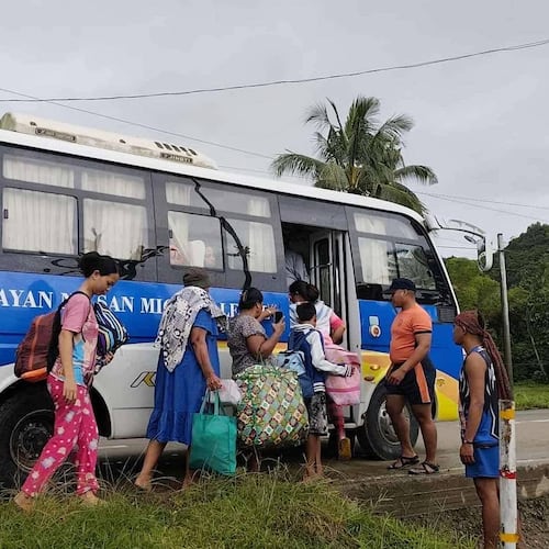 In this photo provided by the Philippine Coast Guard, residents are evacuated to safer grounds as Typhoon Kalmaegi nears the area of San Miguel, Leyte province, Philippines on Monday Nov. 3, 2025. (Philippine Coast Guard via AP)