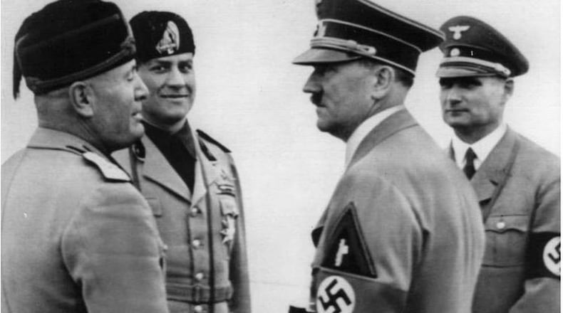 Adolf Hitler, right foreground, and Italy’s Benito Mussolini, left are shown during a Hitler visit in Italy in 1938. Italy’s Foreign Minister Count Galeazzo Ciano, and Hitler’s Deputy Rudolf Hess behind. (AP)