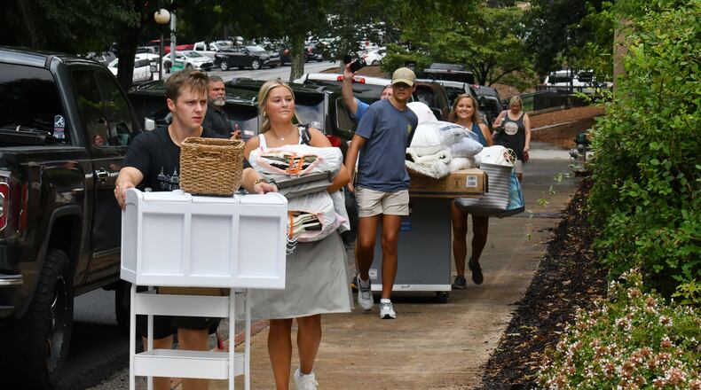 University of Georgia students move into campus housing in August. The school is planning to build a new residence hall for first-year students. (Hyosub Shin /AJC FILE PHOTO)