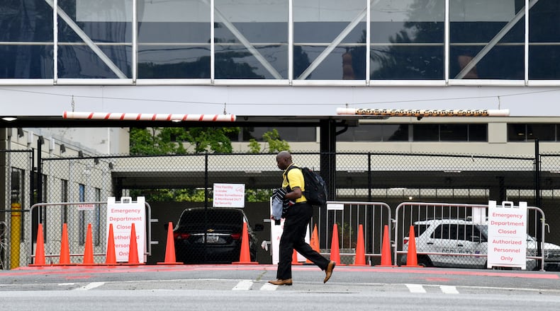 Exterior of Wellstar Atlanta Medical Center, which closed 6 month ago, Wednesday, April 26, 2023, in Atlanta. Wellstar closed Atlanta Medical Center on Nov. 1, 2022. Wellstar has said it closed the AMC hospitals because it was not financially feasible to keep them open, despite millions in improvements. (Hyosub Shin / Hyosub.Shin@ajc.com)