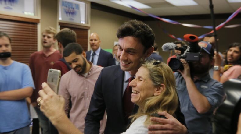 Democrat Jon Ossoff with a supporter. AJC/Bob Andres.